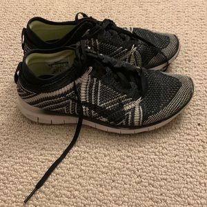 Used Nike Free TR Flyknit sneakers. Womens Size 5.
